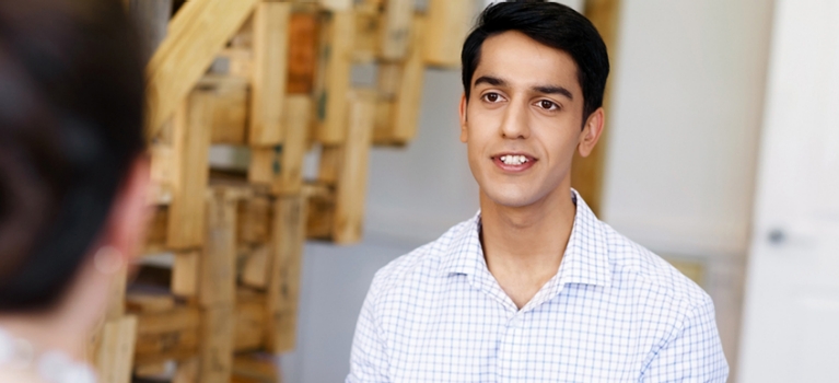 Asian businessman speaking during a business meeting