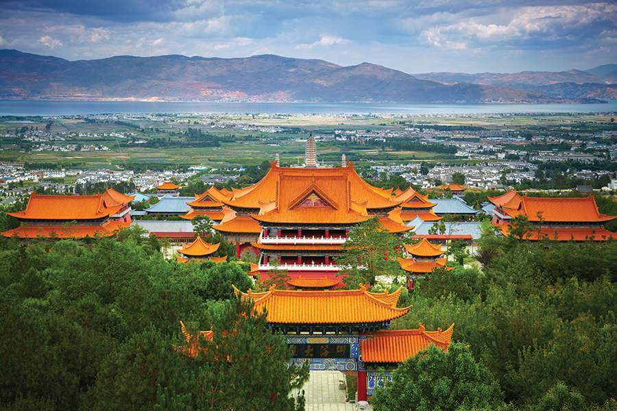 Picture of local homes in with mountains in background Picture of local homes in with mountains in background